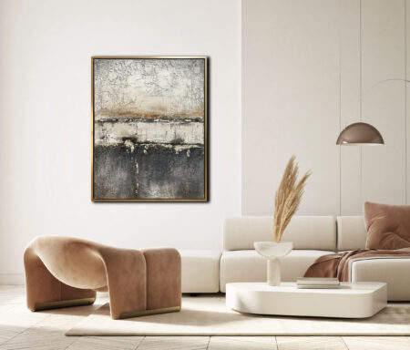 Obraz w odcieniach beżu i szarości w salonie urządzonym w stylu nowoczesnym z welurowym fotelem i dekoracją z trawy pampasowej